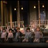 Kristi Coombs as Annie (C) w. orphans in a scene from the New Orleans production of the musical "Annie."