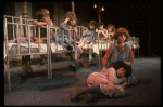 Kristi Coombs as Annie (R) w. orphans in a scene from the New Orleans production of the musical "Annie."