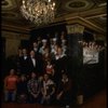 Entire cast posing in lobby of theatre of the New Orleans production of the musical "Annie."