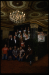 Entire cast posing in lobby of theatre of the New Orleans production of the musical "Annie."