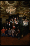 Entire cast posing in lobby of theatre of the New Orleans production of the musical "Annie."