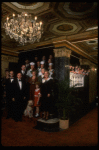 Entire cast posing in lobby of theatre of the New Orleans production of the musical "Annie."