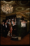 Entire cast posing in lobby of theatre of the New Orleans production of the musical "Annie."