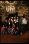 Entire cast posing in lobby of theatre of the New Orleans production of the musical "Annie."