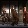 R) Jane Connell as Miss Hannigan w. Rooster and Lily in a scene from the New Orleans production of the musical "Annie."