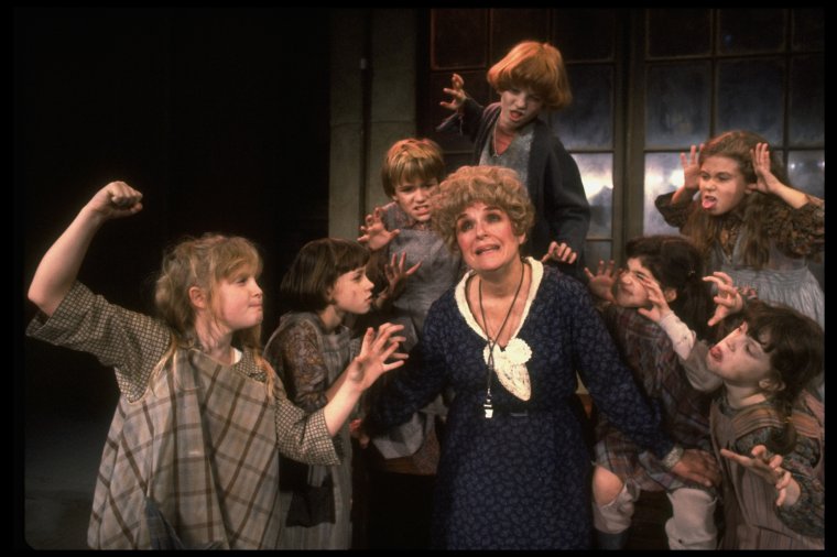 Jane Connell as Miss Hannigan w. orphans in a scene from the New ...