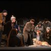 Kristi Coombs as Annie w. Sandy and Hooverville-ites in a scene from the New Orleans production of the musical "Annie."