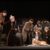 Kristi Coombs as Annie w. Sandy and Hooverville-ites in a scene from the New Orleans production of the musical "Annie."