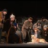 Kristi Coombs as Annie w. Sandy and Hooverville-ites in a scene from the New Orleans production of the musical "Annie."