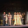 Kristi Coombs as Annie (4L) and Reid Shelton as Daddy Warbucks (3L) in a scene from a touring company of the musical "Annie." (New Orleans)