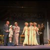 Kristi Coombs as Annie (4L) and Reid Shelton as Daddy Warbucks (3L) in a scene from a touring company of the musical "Annie." (New Orleans)