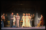 Kristi Coombs as Annie (4L) and Reid Shelton as Daddy Warbucks (3L) in a scene from a touring company of the musical "Annie." (New Orleans)