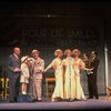 Kristi Coombs as Annie (4L) and Reid Shelton as Daddy Warbucks (3L) in a scene from a touring company of the musical "Annie." (New Orleans)