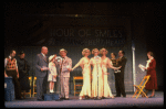 Kristi Coombs as Annie (4L) and Reid Shelton as Daddy Warbucks (3L) in a scene from a touring company of the musical "Annie." (New Orleans)