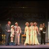 Kristi Coombs as Annie (4L) and Reid Shelton as Daddy Warbucks (3L) in a scene from a touring company of the musical "Annie." (New Orleans)