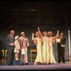 Kristi Coombs as Annie (4L) and Reid Shelton as Daddy Warbucks (3L) in a scene from a touring company of the musical "Annie." (New Orleans)