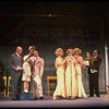 Kristi Coombs as Annie (4L) and Reid Shelton as Daddy Warbucks (3L) in a scene from a touring company of the musical "Annie." (New Orleans)