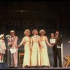 Kristi Coombs as Annie (4L) and Reid Shelton as Daddy Warbucks (3L) in a scene from a touring company of the musical "Annie." (New Orleans)