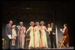 Kristi Coombs as Annie (4L) and Reid Shelton as Daddy Warbucks (3L) in a scene from a touring company of the musical "Annie." (New Orleans)