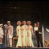 Kristi Coombs as Annie (4L) and Reid Shelton as Daddy Warbucks (3L) in a scene from a touring company of the musical "Annie." (New Orleans)