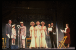 Kristi Coombs as Annie (4L) and Reid Shelton as Daddy Warbucks (3L) in a scene from a touring company of the musical "Annie." (New Orleans)