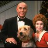 Roseanne Sorrentino as Annie and Harve Presnell as Daddy Warbucks w. Sandy in a scene from the touring company of the musical "Annie." (Louisville)