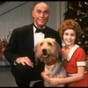 Roseanne Sorrentino as Annie and Harve Presnell as Daddy Warbucks w. Sandy in a scene from the touring company of the musical "Annie." (Louisville)