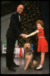 Roseanne Sorrentino as Annie and Harve Presnell as Daddy Warbucks w. Sandy in a scene from the touring company of the musical "Annie." (Louisville)