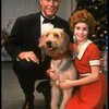Roseanne Sorrentino as Annie and Harve Presnell as Daddy Warbucks w. Sandy in a scene from the touring company of the musical "Annie." (Louisville)