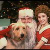 Roseanne Sorrentino as Annie w. Santa Claus and Sandy in a scene from the touring company of the musical "Annie." (Louisville)