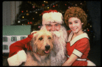 Roseanne Sorrentino as Annie w. Santa Claus and Sandy in a scene from the touring company of the musical "Annie." (Louisville)