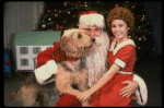 Roseanne Sorrentino as Annie w. Santa Claus and Sandy in a scene from the touring company of the musical "Annie." (Louisville)