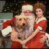 Roseanne Sorrentino as Annie w. Santa Claus and Sandy in a scene from the touring company of the musical "Annie." (Louisville)