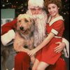 Roseanne Sorrentino as Annie w. Santa Claus and Sandy in a scene from the touring company of the musical "Annie." (Louisville)