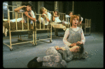 Bridget Walsh as Annie w. orphans in a scene from a touring company of the musical "Annie." (Fort Worth)