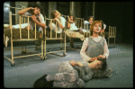 Bridget Walsh as Annie w. orphans in a scene from a touring company of the musical "Annie." (Fort Worth)