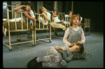 Bridget Walsh as Annie w. orphans in a scene from a touring company of the musical "Annie." (Fort Worth)