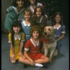 Bridget Walsh as Annie w. Sandy and orphans in a scene from a touring company of the musical "Annie." (Fort Worth)