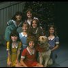 Bridget Walsh as Annie w. Sandy and orphans in a scene from a touring company of the musical "Annie." (Fort Worth)