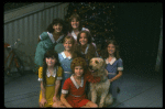 Bridget Walsh as Annie w. Sandy and orphans in a scene from a touring company of the musical "Annie." (Fort Worth)