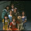 Bridget Walsh as Annie w. Sandy and orphans in a scene from a touring company of the musical "Annie." (Fort Worth)