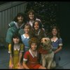 Bridget Walsh as Annie w. Sandy and orphans in a scene from a touring company of the musical "Annie." (Fort Worth)