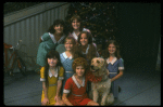 Bridget Walsh as Annie w. Sandy and orphans in a scene from a touring company of the musical "Annie." (Fort Worth)