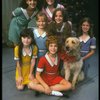 Bridget Walsh as Annie w. Sandy and orphans in a scene from a touring company of the musical "Annie." (Fort Worth)