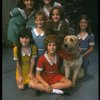 Bridget Walsh as Annie w. Sandy and orphans in a scene from a touring company of the musical "Annie." (Fort Worth)