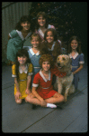 Bridget Walsh as Annie w. Sandy and orphans in a scene from a touring company of the musical "Annie." (Fort Worth)