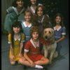 Bridget Walsh as Annie w. Sandy and orphans in a scene from a touring company of the musical "Annie." (Fort Worth)