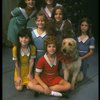 Bridget Walsh as Annie w. Sandy and orphans in a scene from a touring company of the musical "Annie." (Fort Worth)