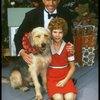 Bridget Walsh as Annie and Rhodes Reason as Daddy Warbucks w. Sandy in a scene from a touring company of the musical "Annie." (Fort Worth)