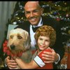 Bridget Walsh as Annie and Rhodes Reason as Daddy Warbucks w. Sandy in a scene from a touring company of the musical "Annie." (Fort Worth)